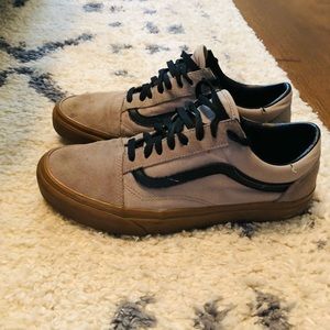 Vans. Grey and black with gummy soles.